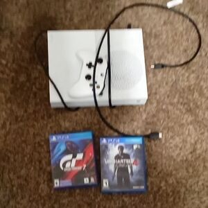 Xbox One S system with PlayStation 4 games